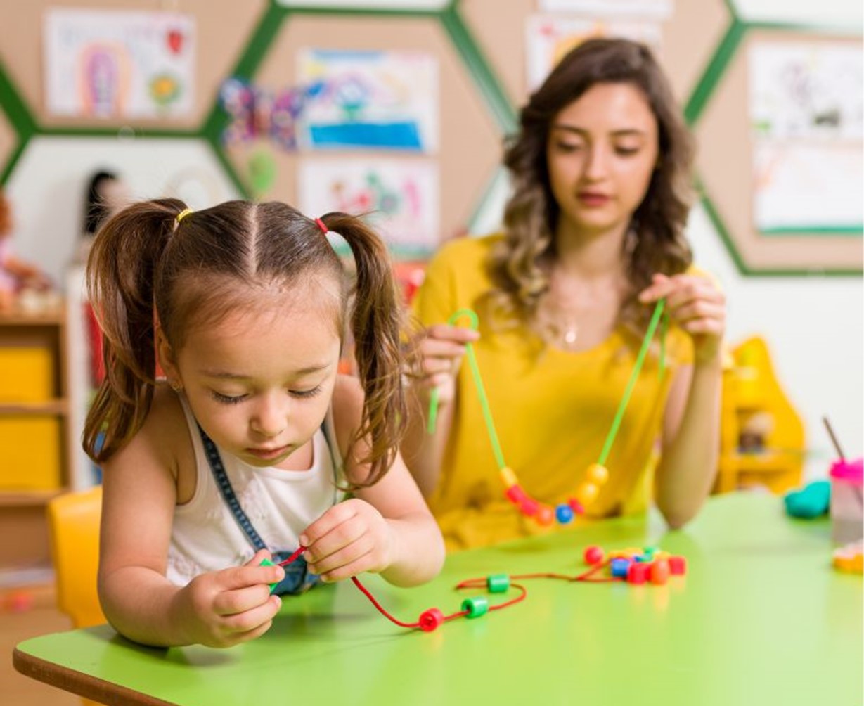 Occupational Therapist teaching fine motor skills