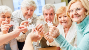 Happy Dementia Seniors Playing the Puzzle