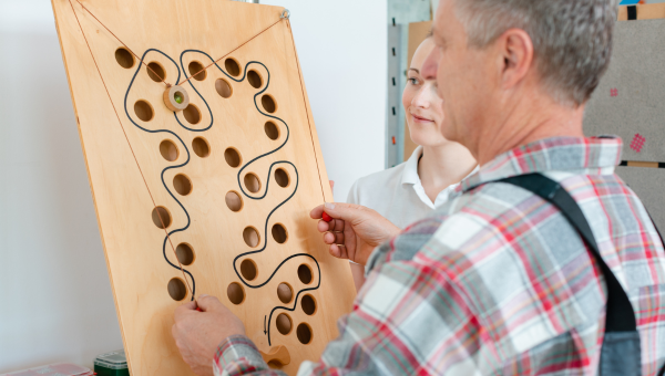 Man in Occupational Therapy Testing His Dexterity